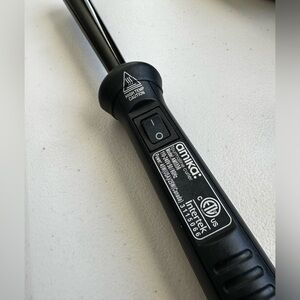Amika clipless conical curling wand